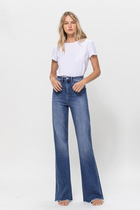 Woman wearing Super High Rise Relaxed Flare Blue Jeans