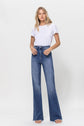 Woman wearing Super High Rise Relaxed Flare Blue Jeans