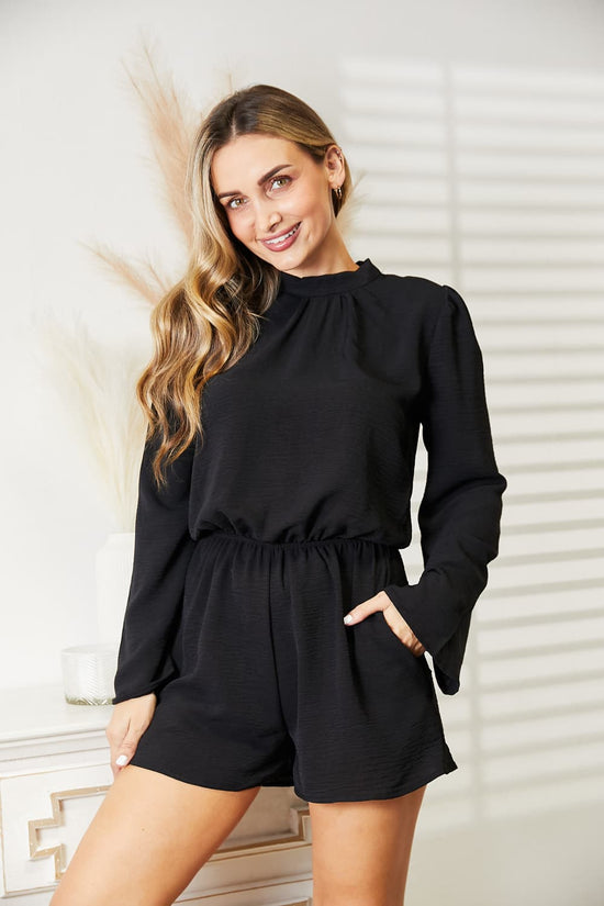 women wearing Black Culture Code Full Size Open Back Romper with Pockets