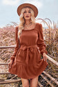 Woman wearing brick red Ruffle Trim Tie Waist Balloon Sleeve Mini Dress