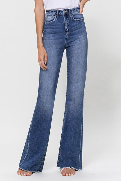 Woman wearing Super High Rise Relaxed Flare Blue Jeans