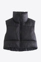 Women wearing a black- Fall - Winter- Zip-Up -Drawstring- Puffer -Vest -sleeveless Jacket