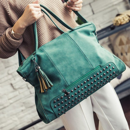 Vegan leather studded handbag