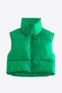 Women wearing a mid green- Fall - Winter- Zip-Up -Drawstring- Puffer -Vest -sleeveless Jacket