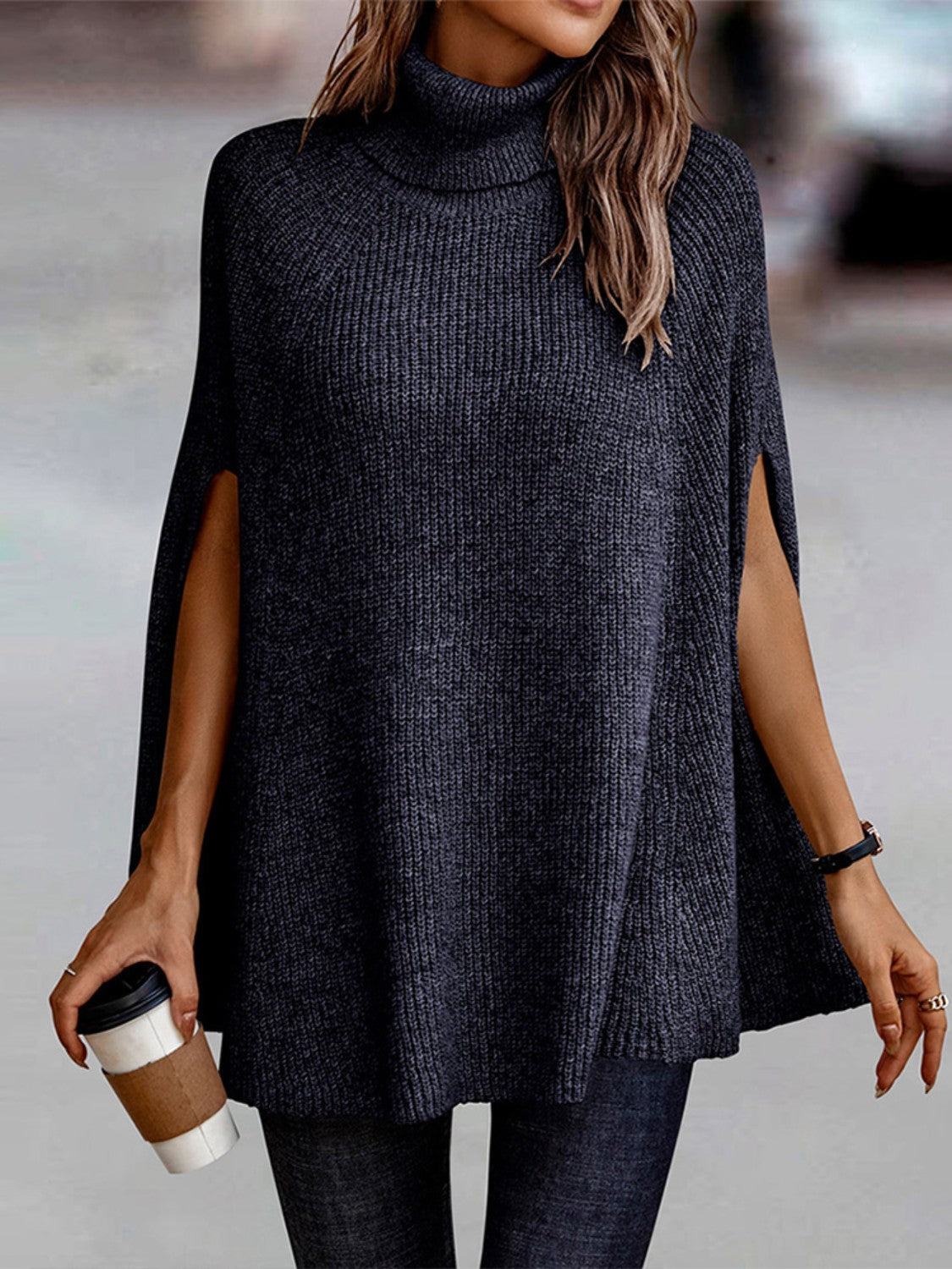 woman wearing a navy Turtleneck Dolman Sleeve Poncho