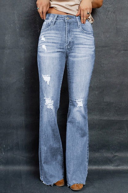 Hem Flare Distressed Raw Jeans