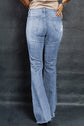 Hem Flare Distressed Raw Jeans