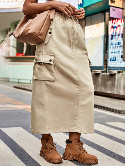 Women wearing a cream Women-Be -Free -Drawstring -Waist -Slit -Denim -Skirt